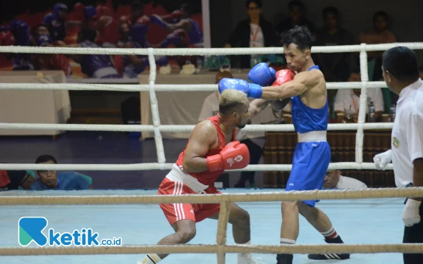 Foto Randy Ngabalin (merah) saat tampil di Pra PON 2023, Kupang NTT (Foto: Randy for Ketik.co.id)