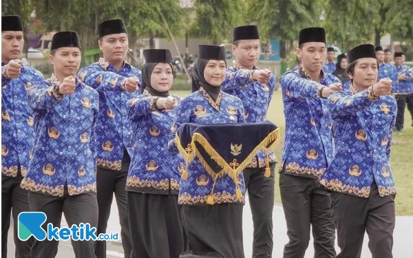 Foto Pasukan pengibar bendera upacara memperingati HUT ke-52 KORPRI yang digelar oleh Pemkab Sleman (Foto: Harda for Ketik.co.id)