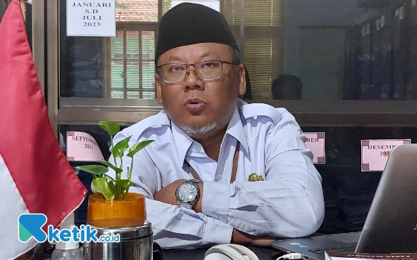 Foto Kasi Penyelenggara Haji dan Umrah Kemenag Kabupaten Kediri, Abdul Kholiq Nawawi saat dikonfirmasi Rabu (24/1/2024). (foto : isa/Ketik.co.id).