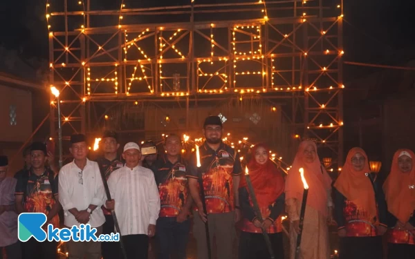 Foto Bupati Halsel, Ketua PKK, Kades dan Jajaran KKIG Halsel (Foto Alif For Ketik.co.id)