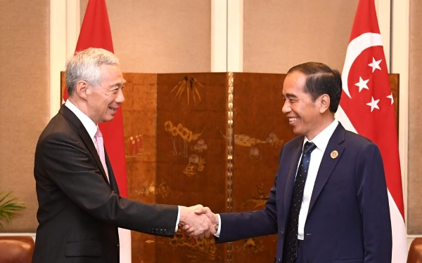 Jokowi Teken UU Ekstradisi dengan Singapura, Penjahat Tak Bisa Melancong